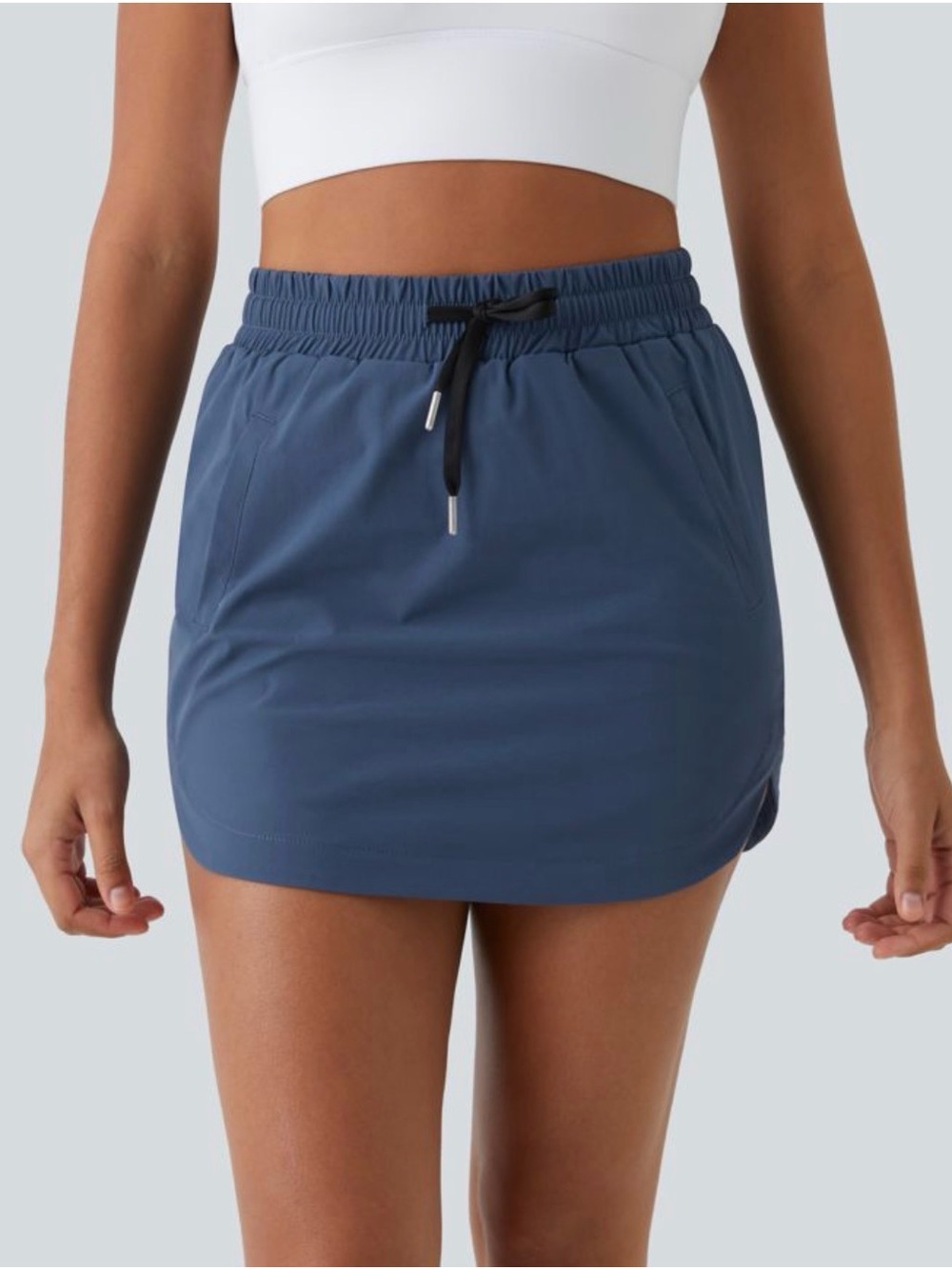 HAKARA High Waisted Drawstring Pocket 2-in-1 Curved Hem Mini Golf Skirt